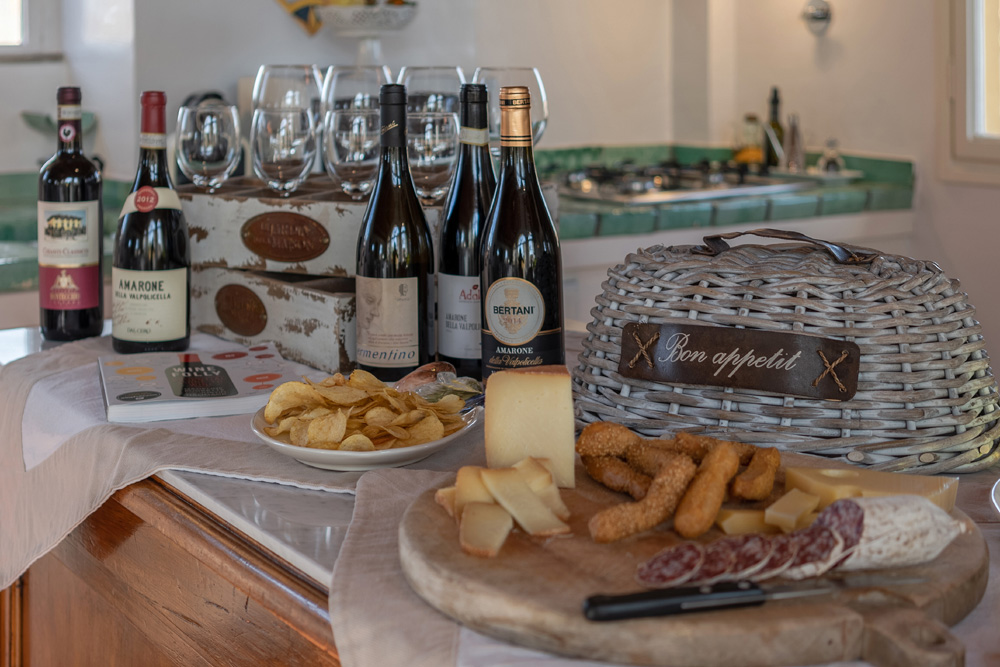 Breakfast setup with wine and local products