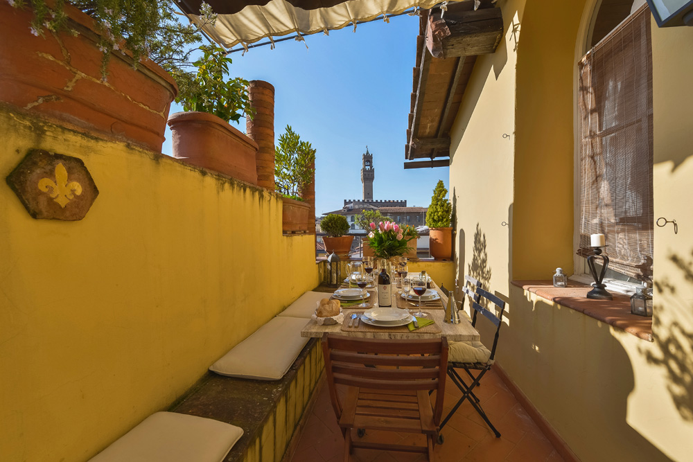 Sunny private terrace with outdoor seating