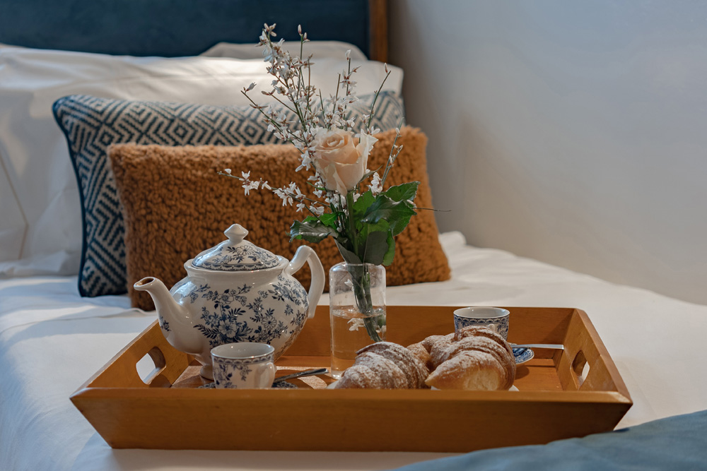 Welcome tray with snacks and drinks in luxury apartment