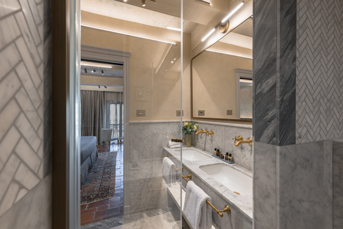 Modern bathroom with double sink in Florence luxury apartment