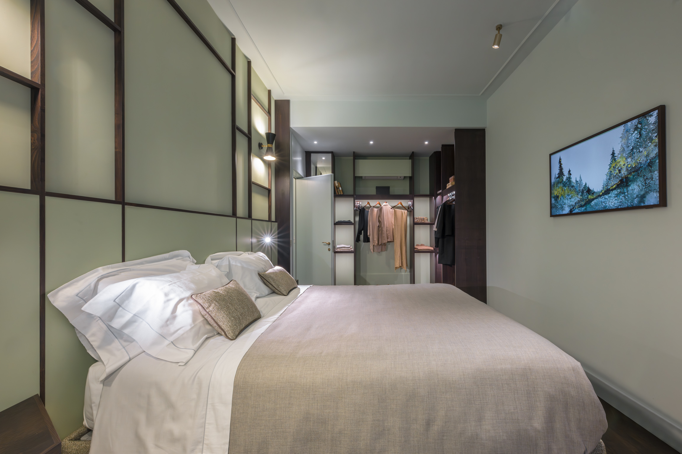 Bedroom with window view in Florence apartment