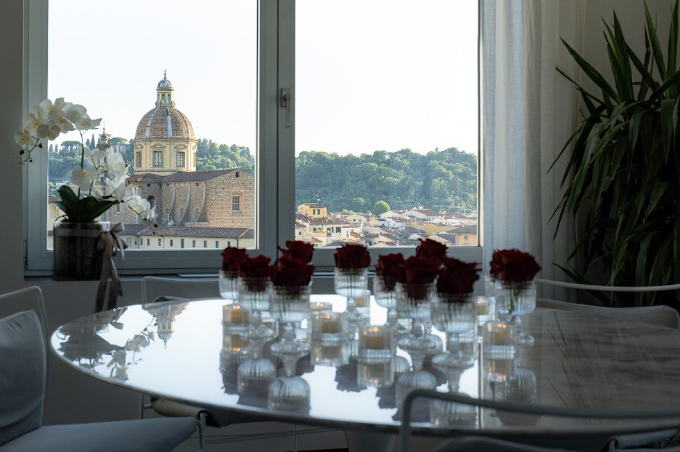 Dining table with scenic Florence skyline