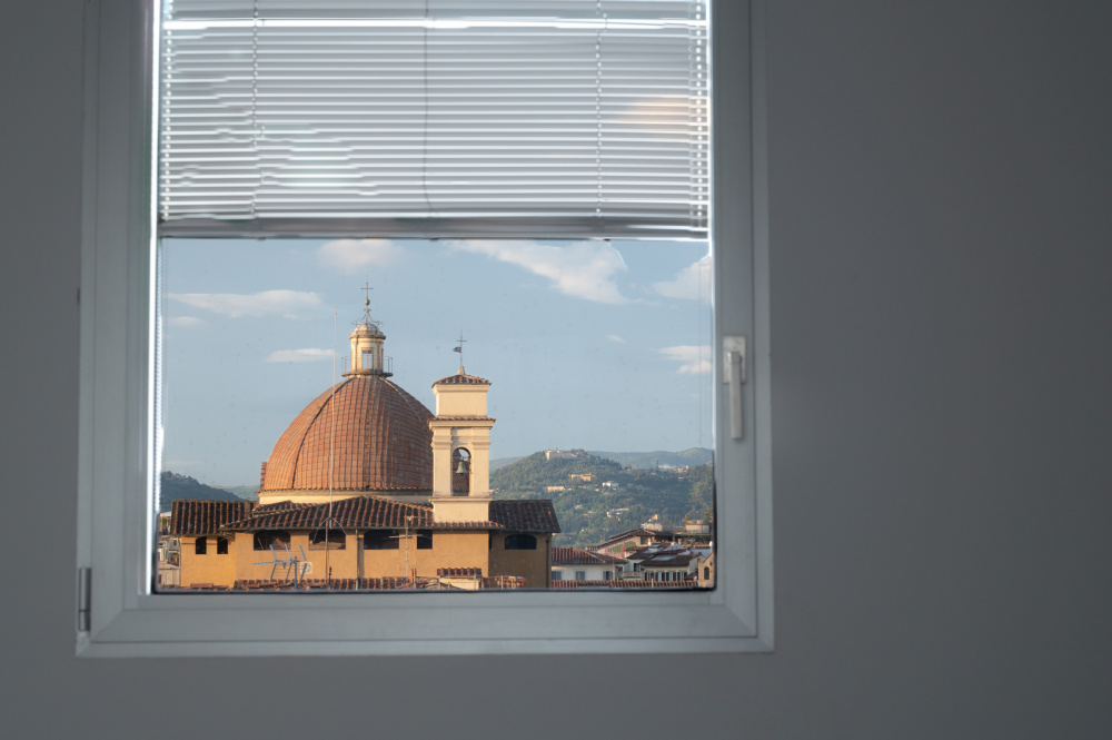 Window view of Florence skyline with dome