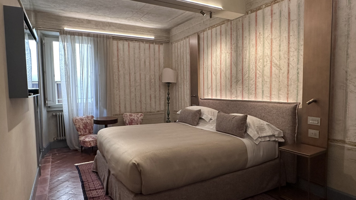 Cassic bedroom in Santa Croce Historical Home apartment in Florence