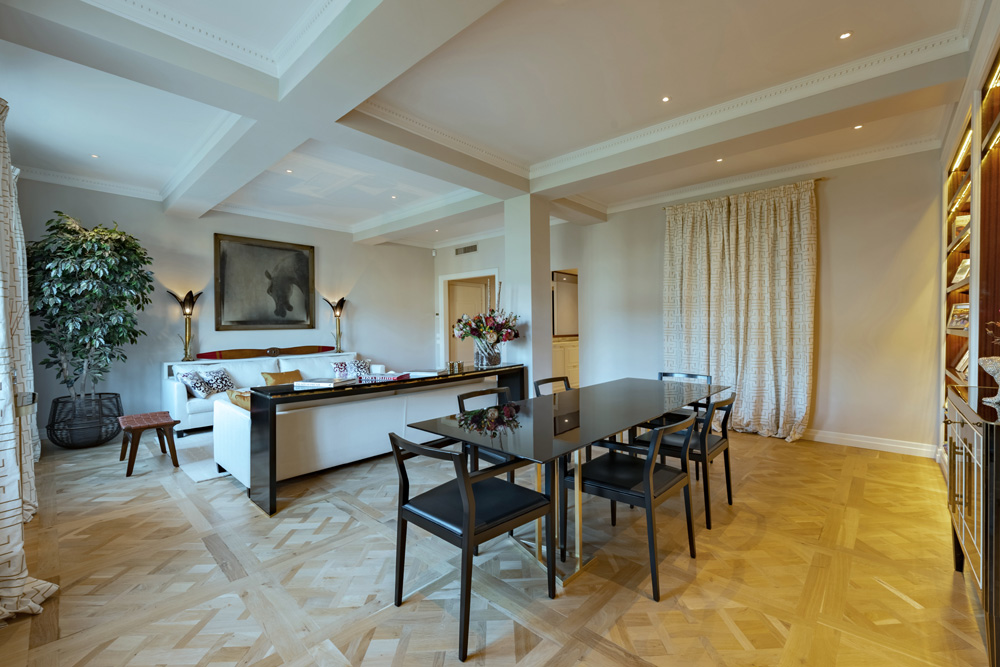 Elegant dining area in Unicko apartment in Florence with bright living space