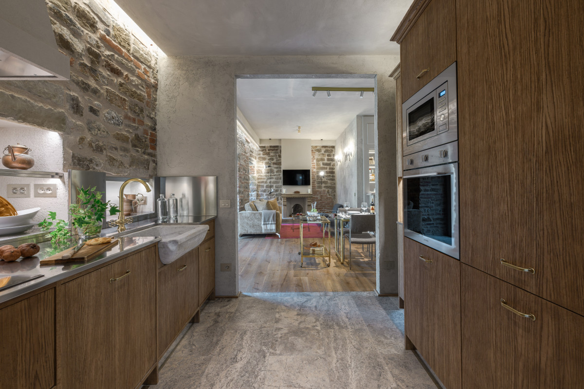 Kitchen in Terme Historical Tower apartment in Florence with modern appliances and elegant design