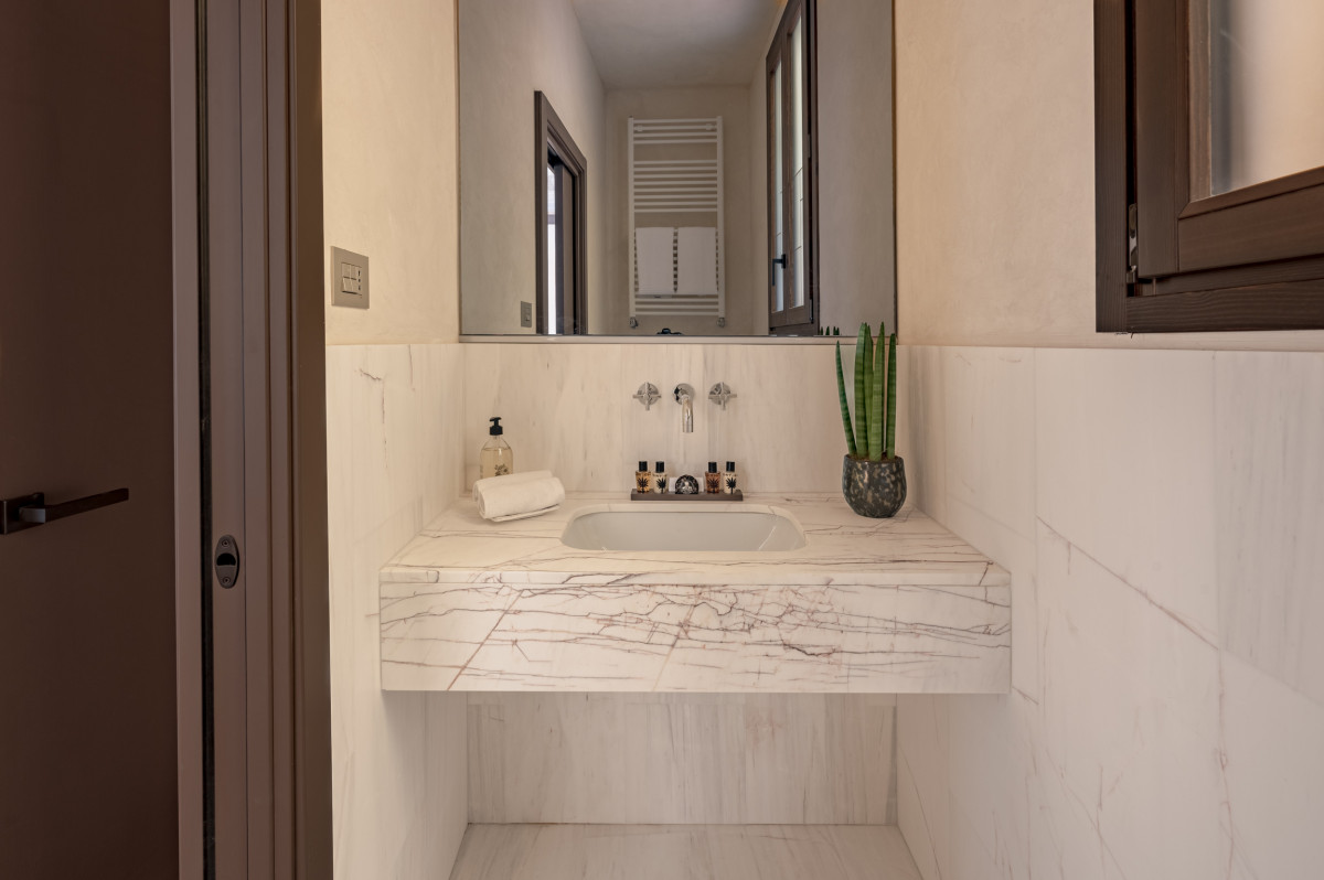 Bathroom sink detail in Florence apartment