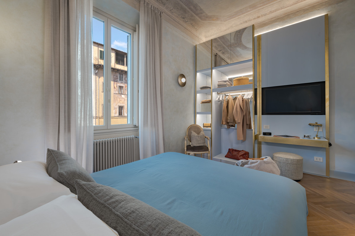 Bright bedroom in Florence apartment