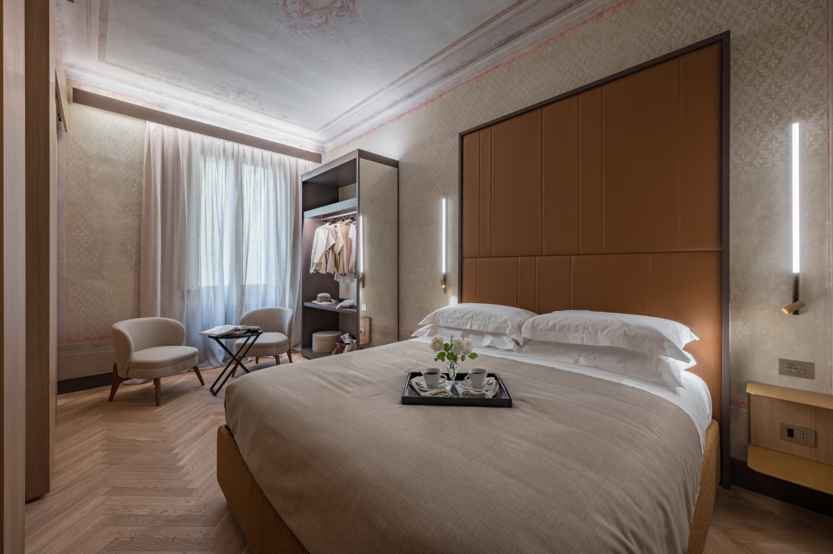 Bedroom with soft lighting in Florence apartment