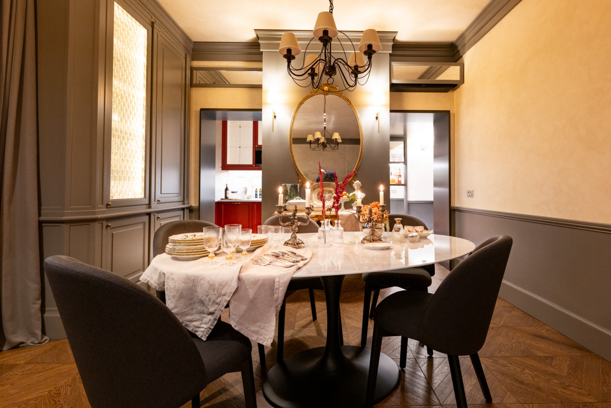 Classic dining area in Florence apartment with refined decor