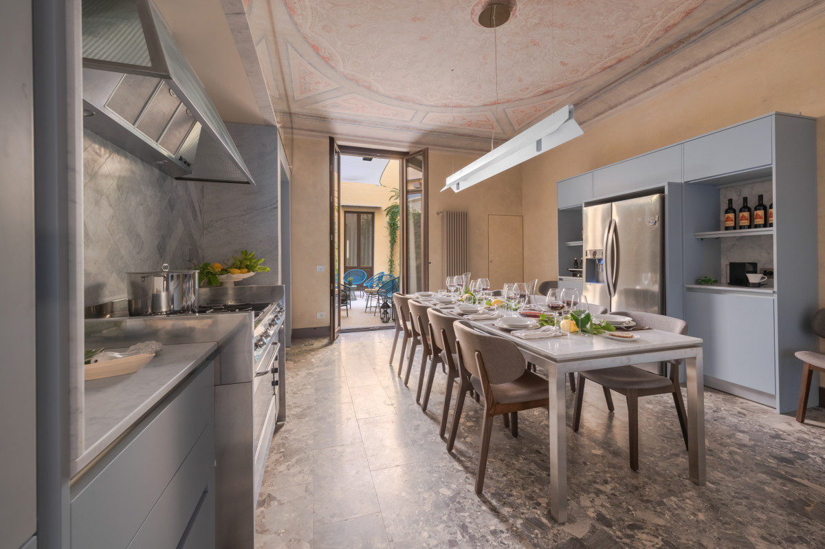Kitchen with island and dining area in Florence apartment