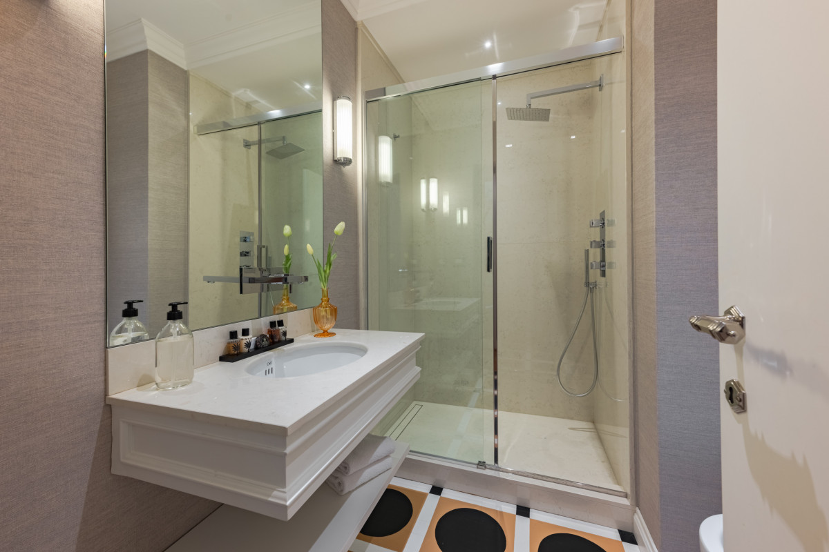 Modern bathroom with shower in Florence apartment