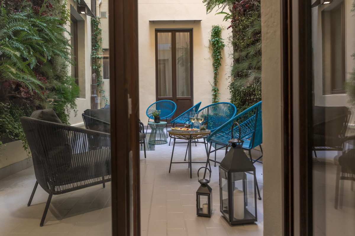 Patio view from interior in Florence apartment