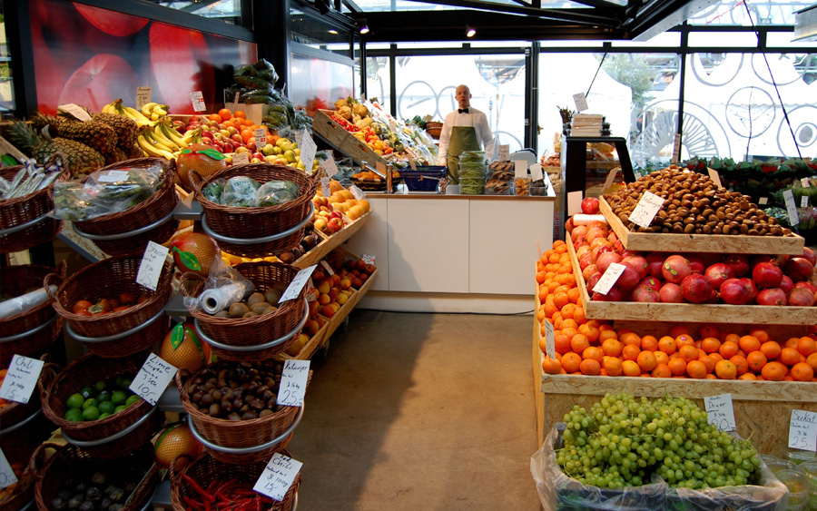Local food market in Florence with fresh fruits and vegetables, authentic Tuscany experience
