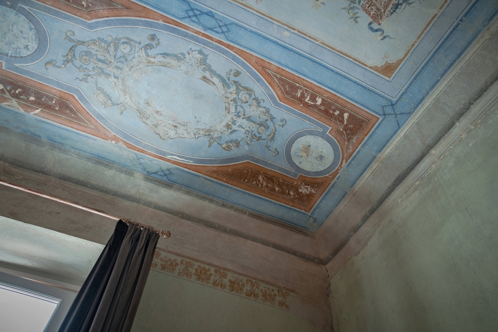 Decorated frescoed ceiling detail in Pitti Historical Home Florence
