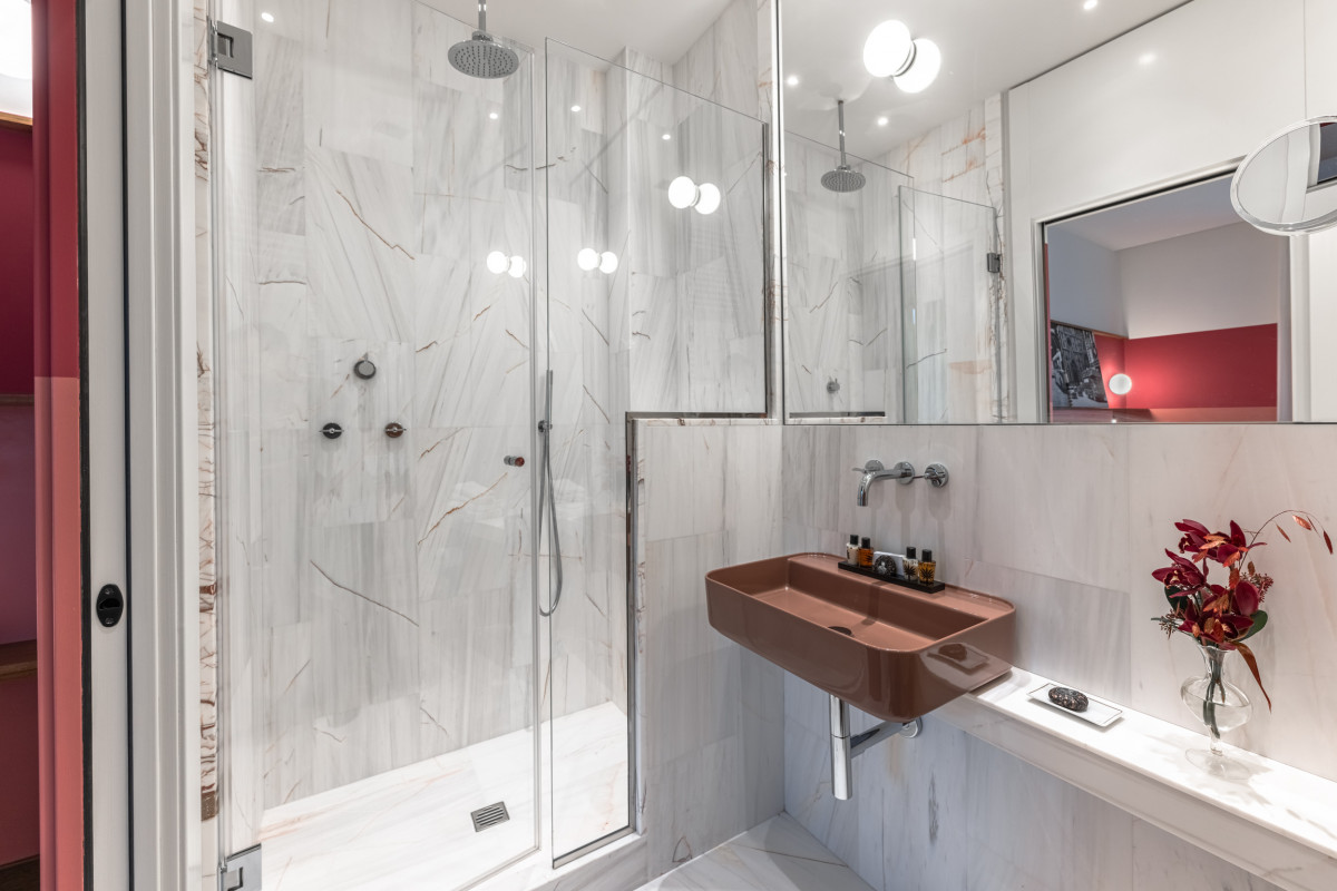 Bathroom with shower and glass enclosure