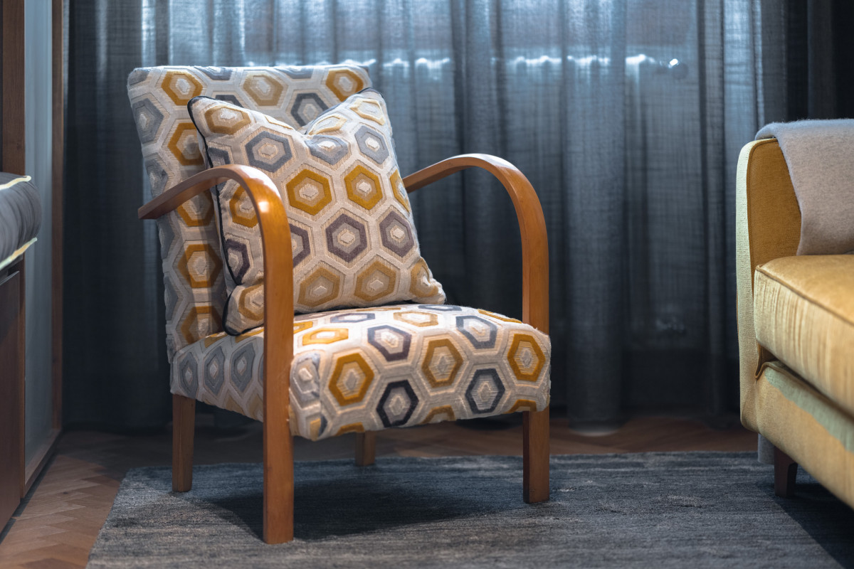 Design armchair detail with patterned fabric