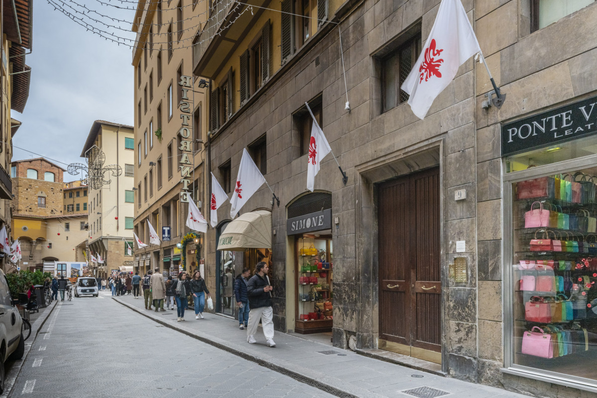 Street view of building entrance in Florence historic center