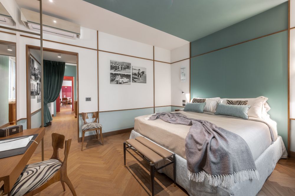 Stunning colorful bedroom with private marble bathroom in the G9 Vasari View apartment