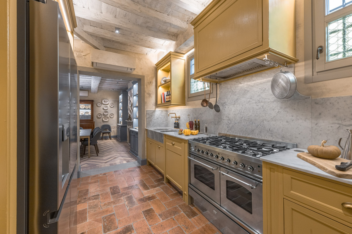 Historic kitchen corridor with classic design in Florence home