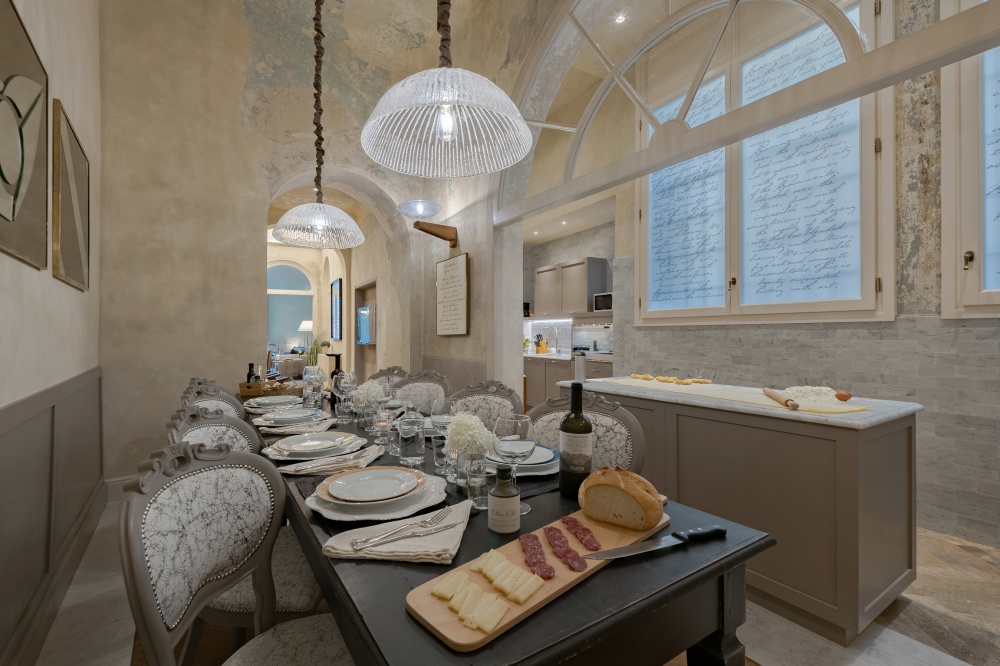Kitchen and dining area in luxury historic apartment in Florence