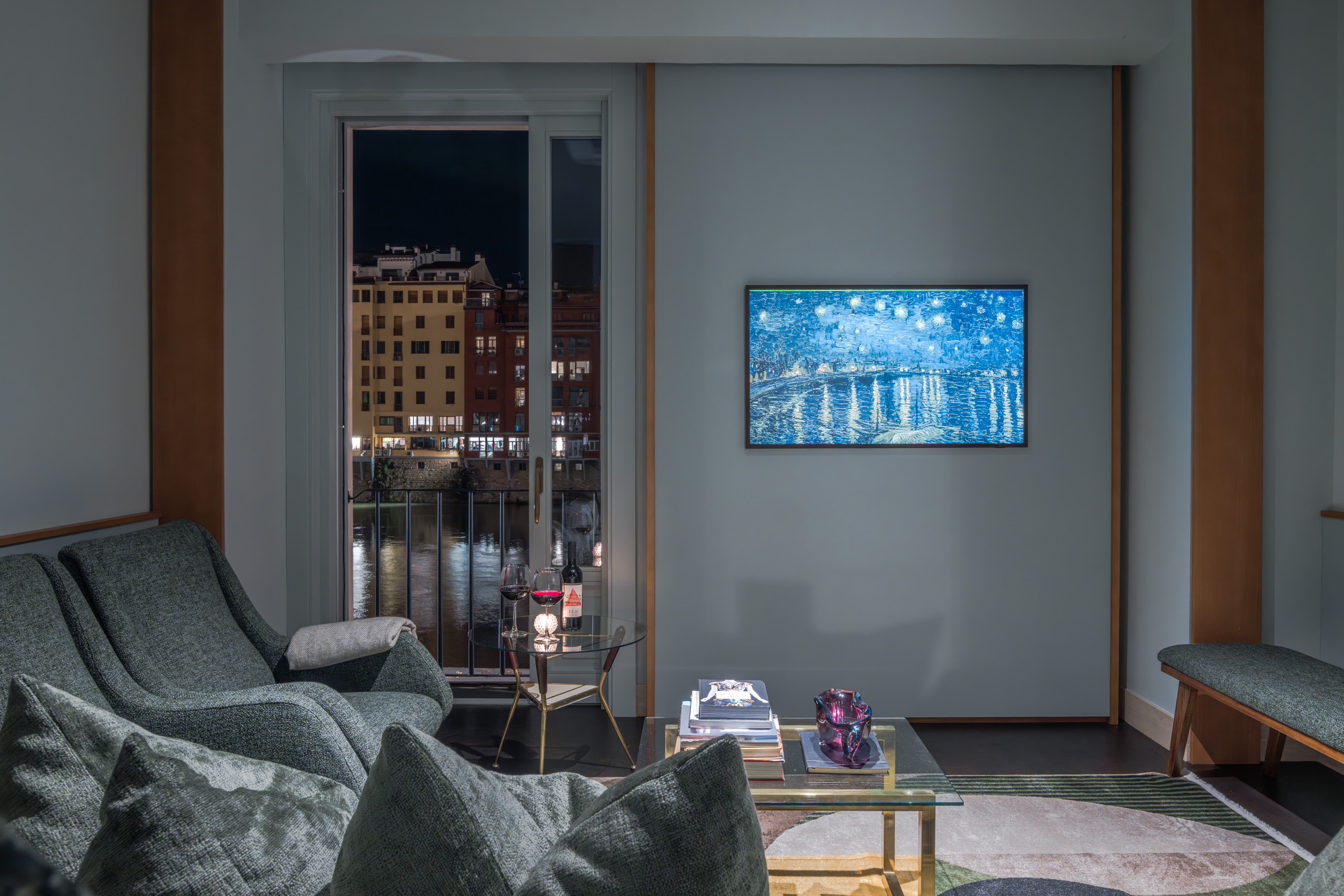 Living room at night with city view in Florence