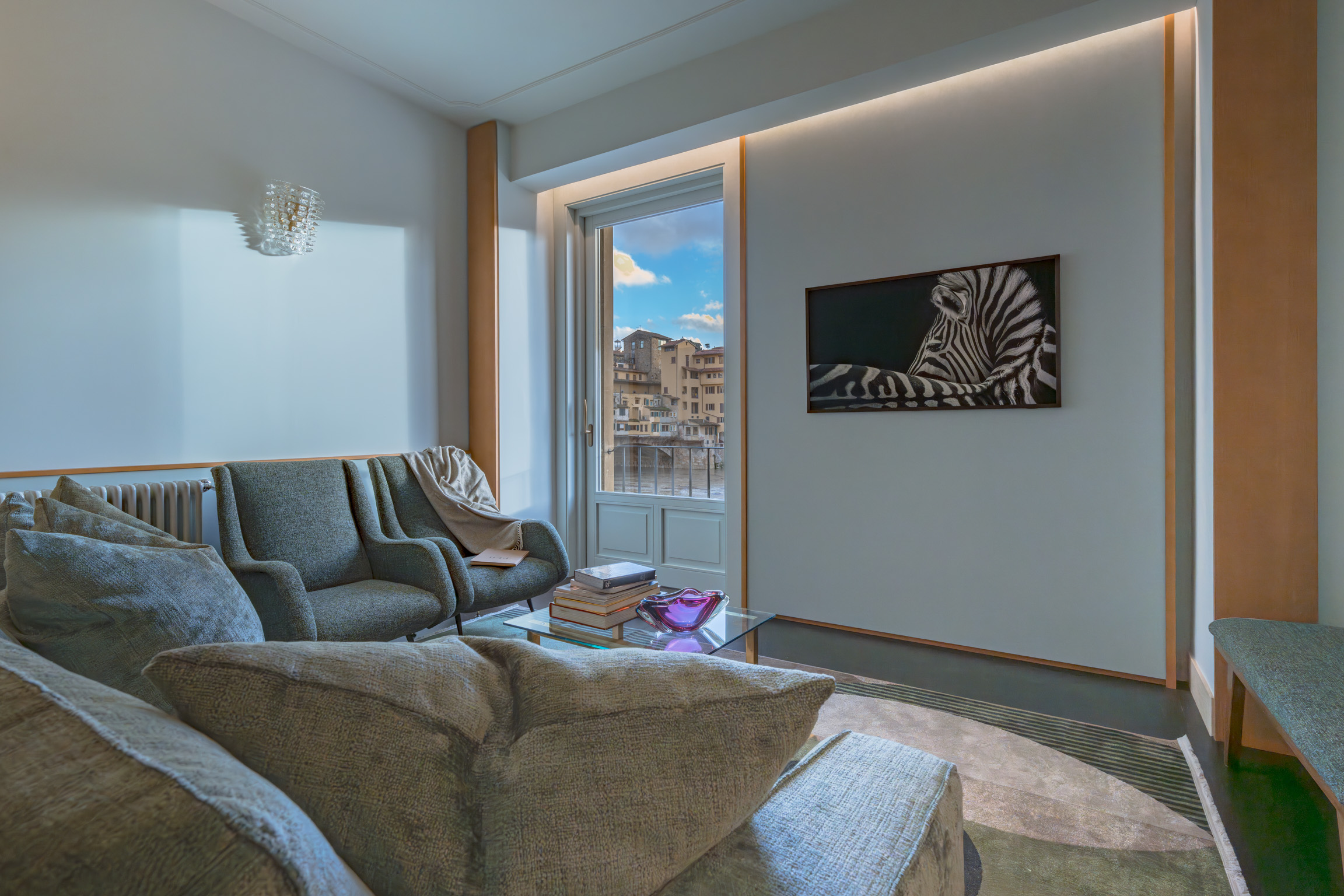 Living room with window view in Florence apartment