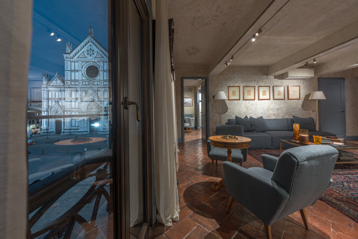 Living room with window view of Santa Croce Basilica in Florence