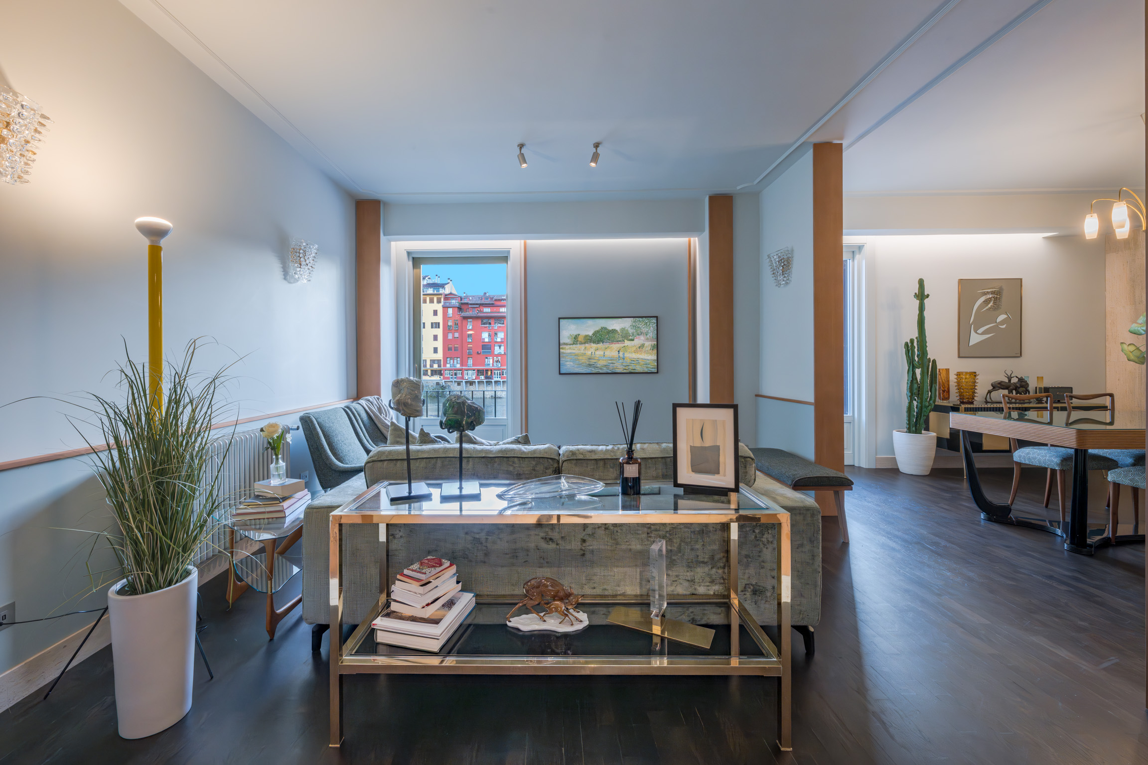 Elegant living room with river view in luxury Ponte Vecchio Panorama apartment in Florence