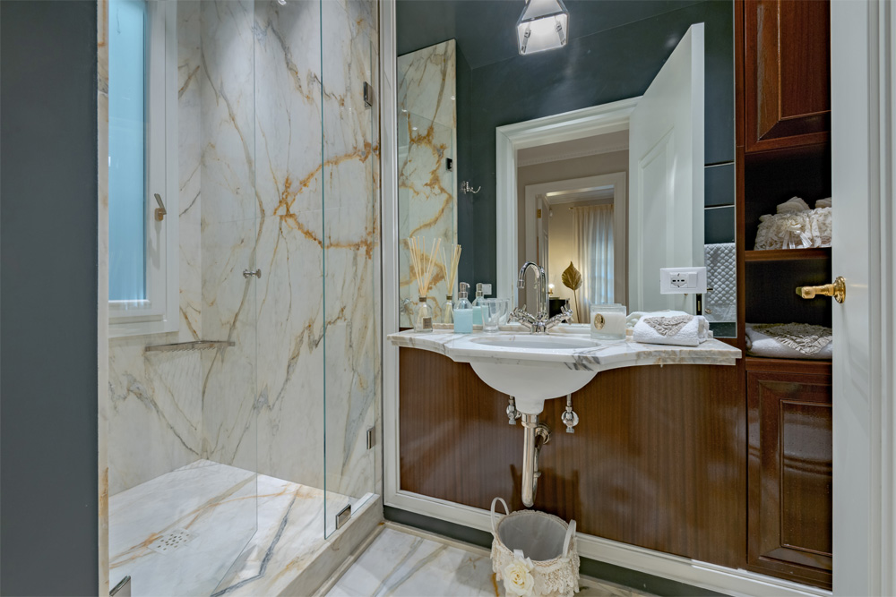 Marble shower detail in Unicko luxury apartment in Florence