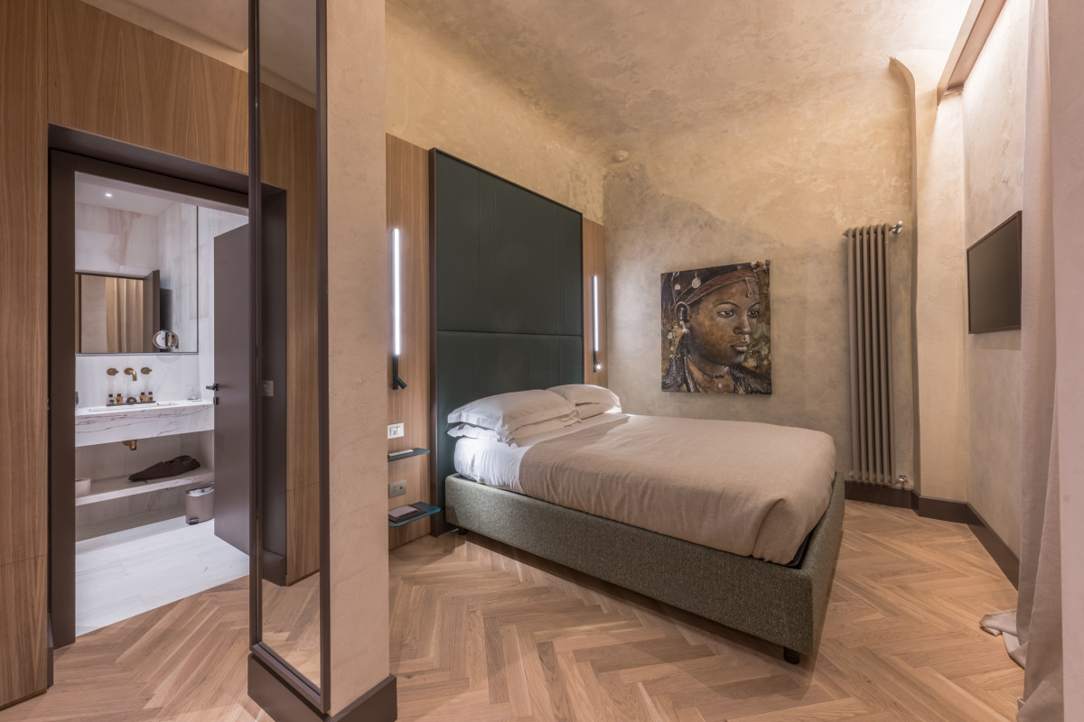 Bedroom in Palazzo Tintori apartment in Florence