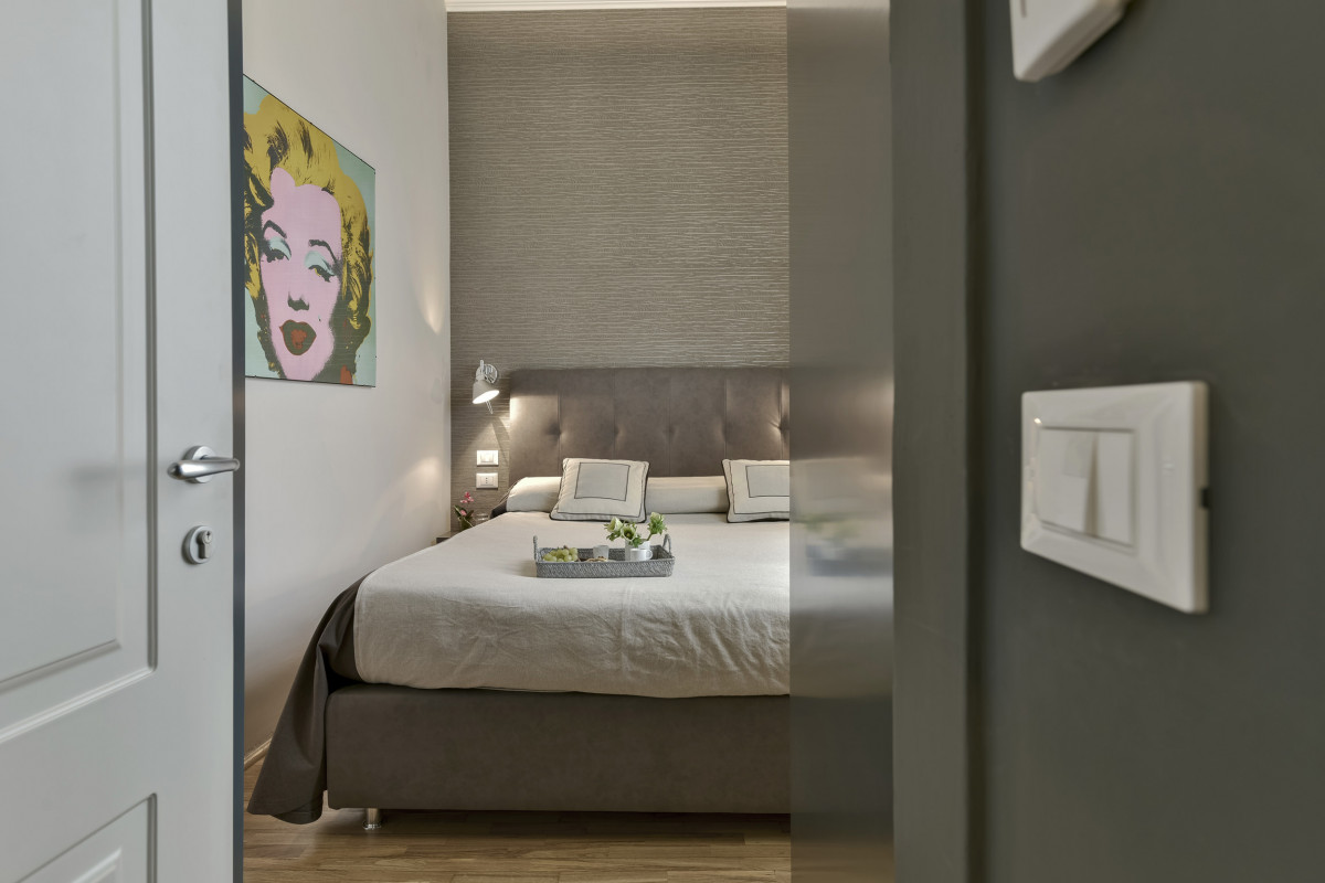 private suite bedroom in Florence luxury apartment