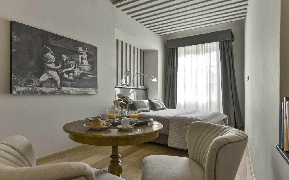 living room with classic table in Florence apartment