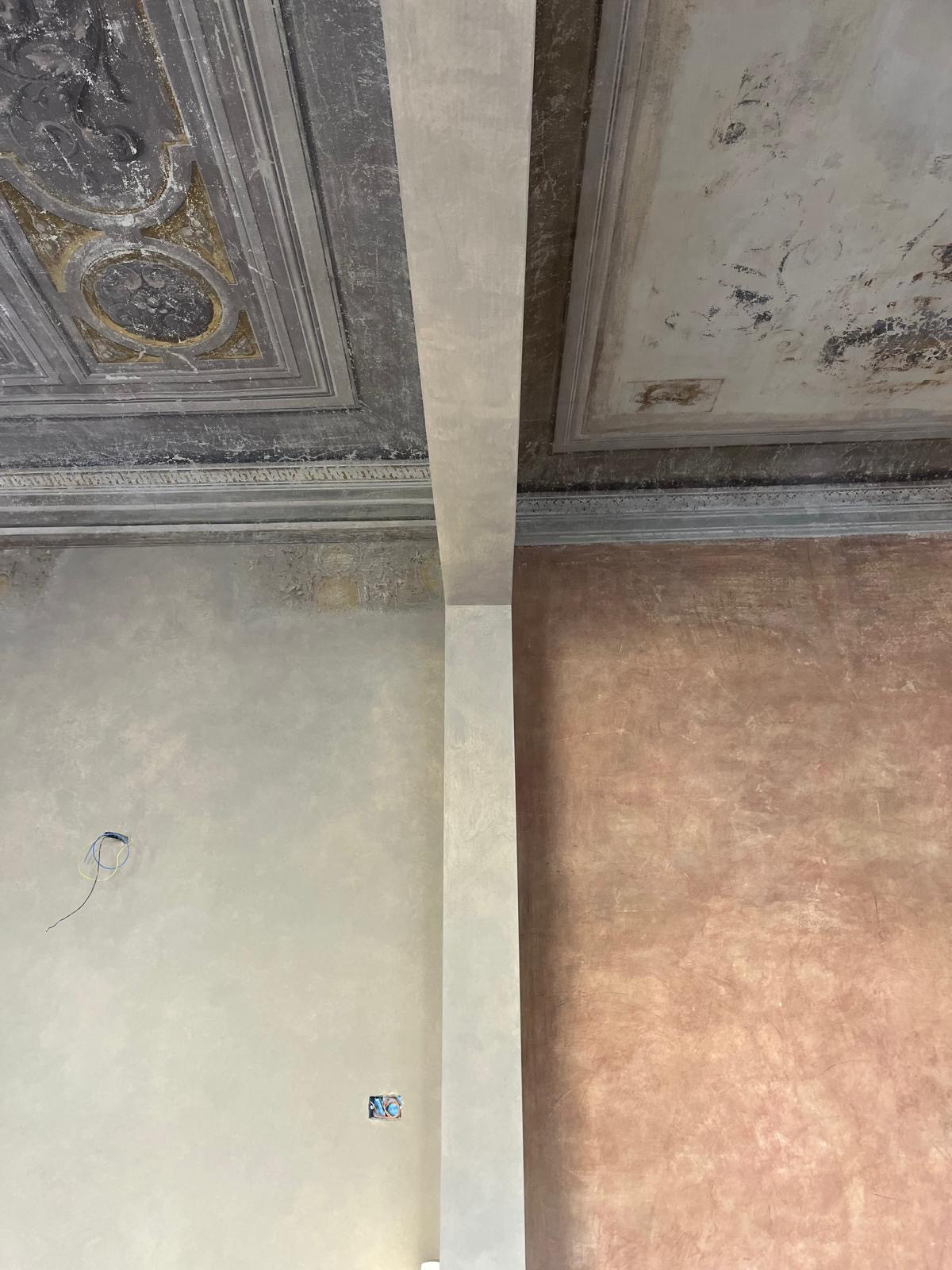 Wall surface before restoration in historic Florence interior